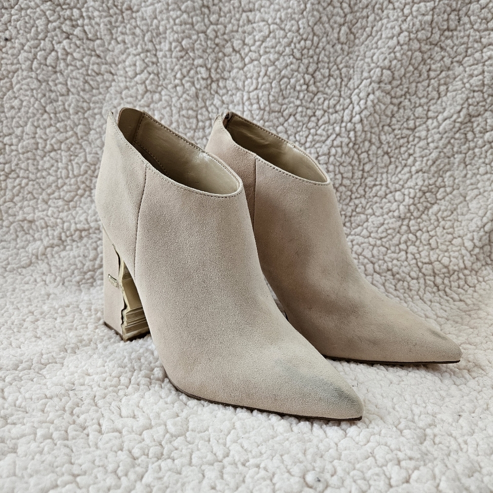 Katy Perry Collections Cream Ankle Booties with Sleek Design